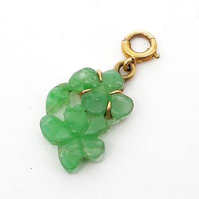 Small Carved Jade Pendant in 14ct Yellow Gold Four Claw Setting