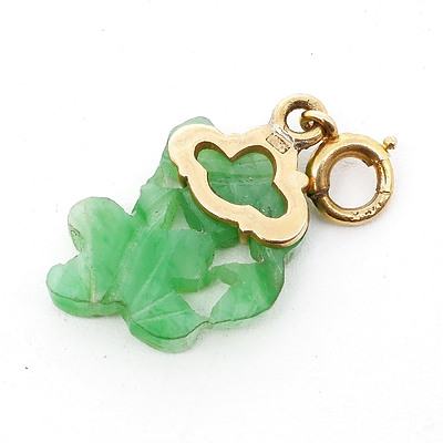Small Carved Jade Pendant in 14ct Yellow Gold Four Claw Setting