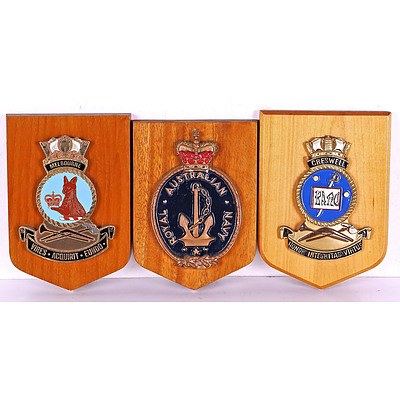 Three Australian Badges on Wood Mounts