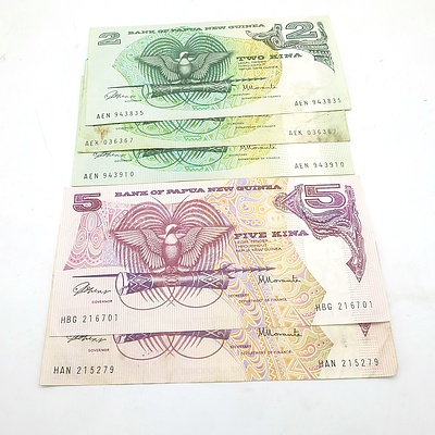 Three Papua New Guinea Two Kina Banknotes and Two Papua New Guinea Five Kina Banknotes