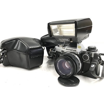 Two Olympus OM10 35mm SLR Cameras