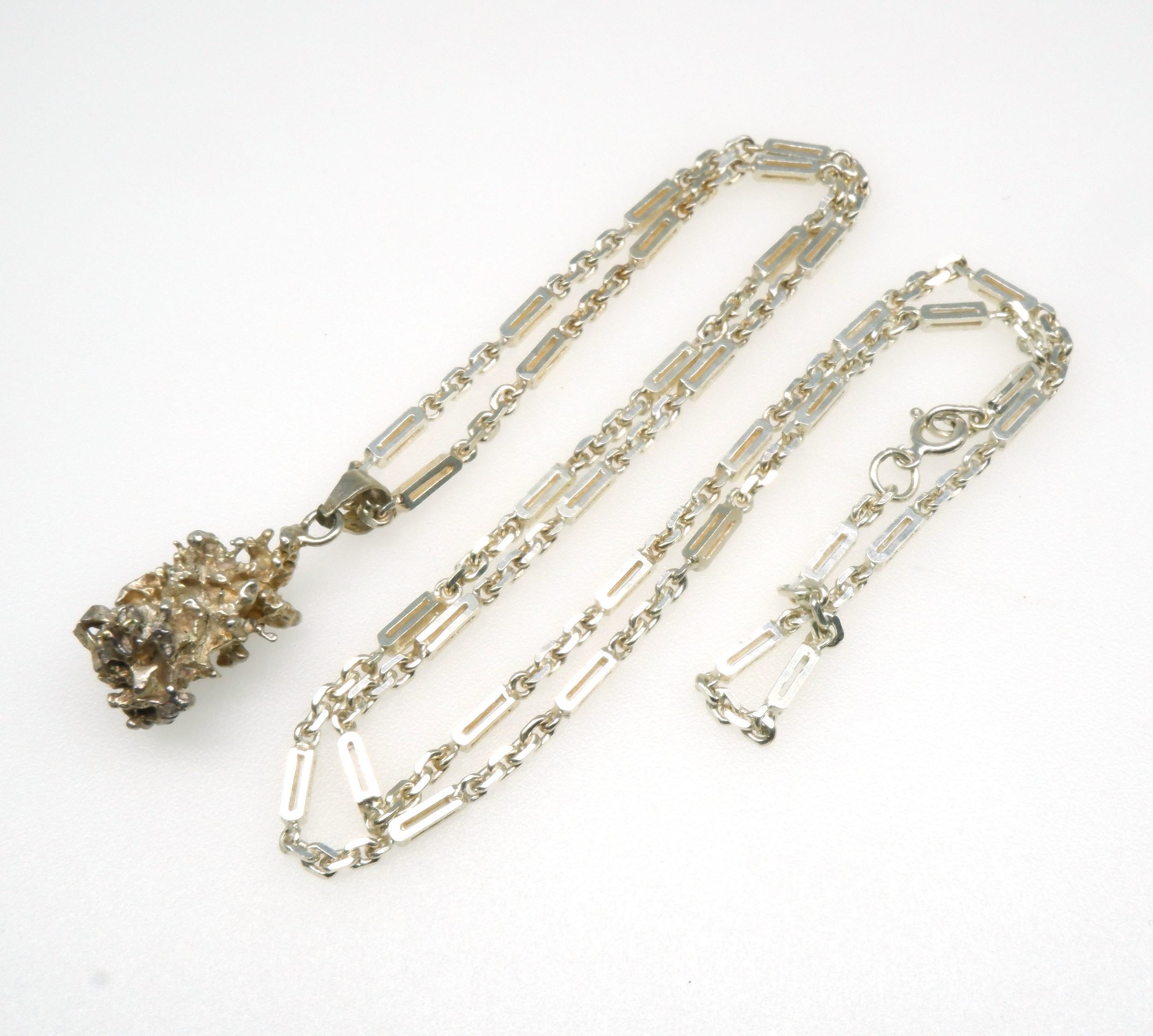 'Long Silver Matchstick Type Chain with a Silver Freeform Nugget Pendant'