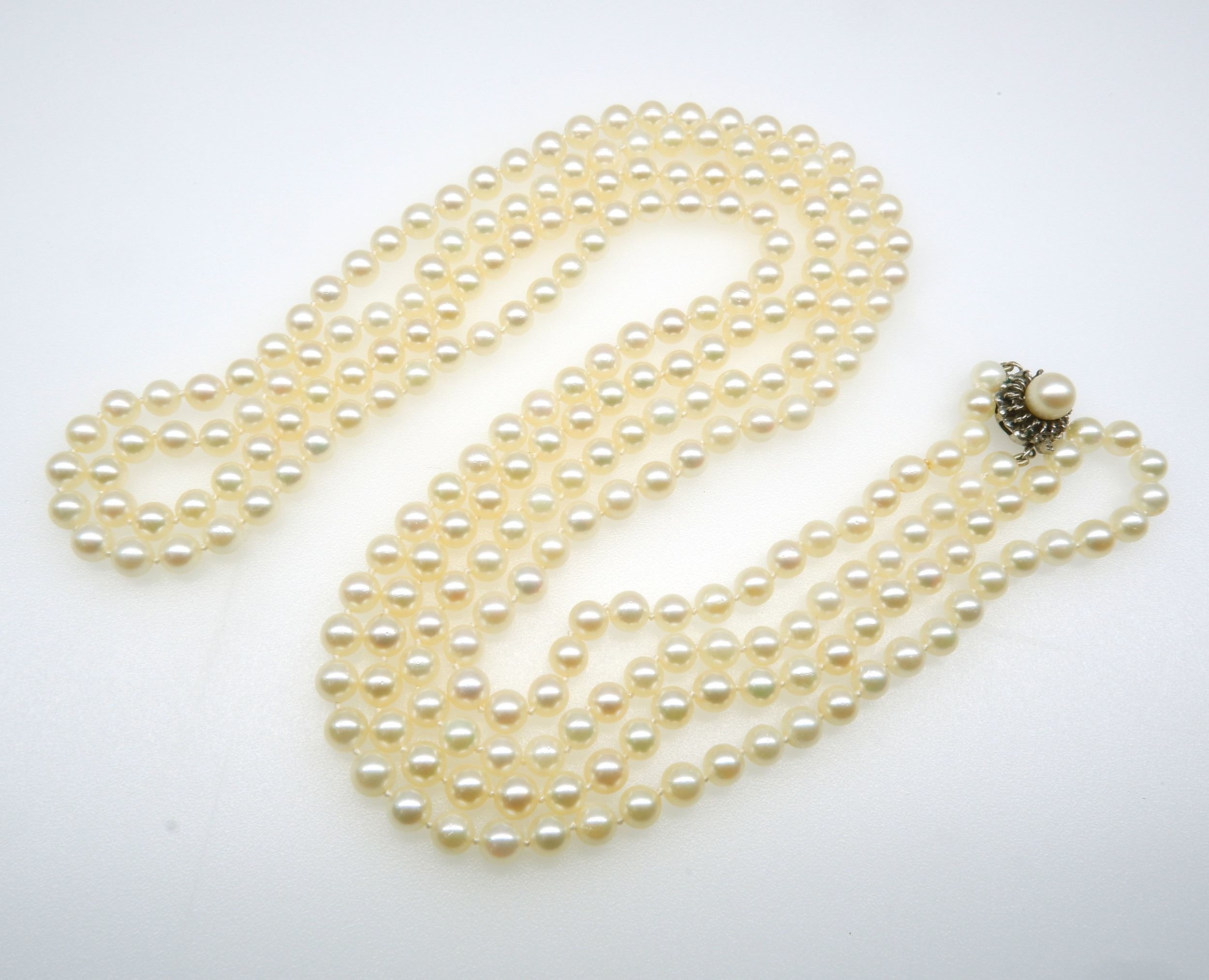 'Extra Long Stand of White Round Cultured Akoya Type Pearls with 14ct White Gold Clasp'