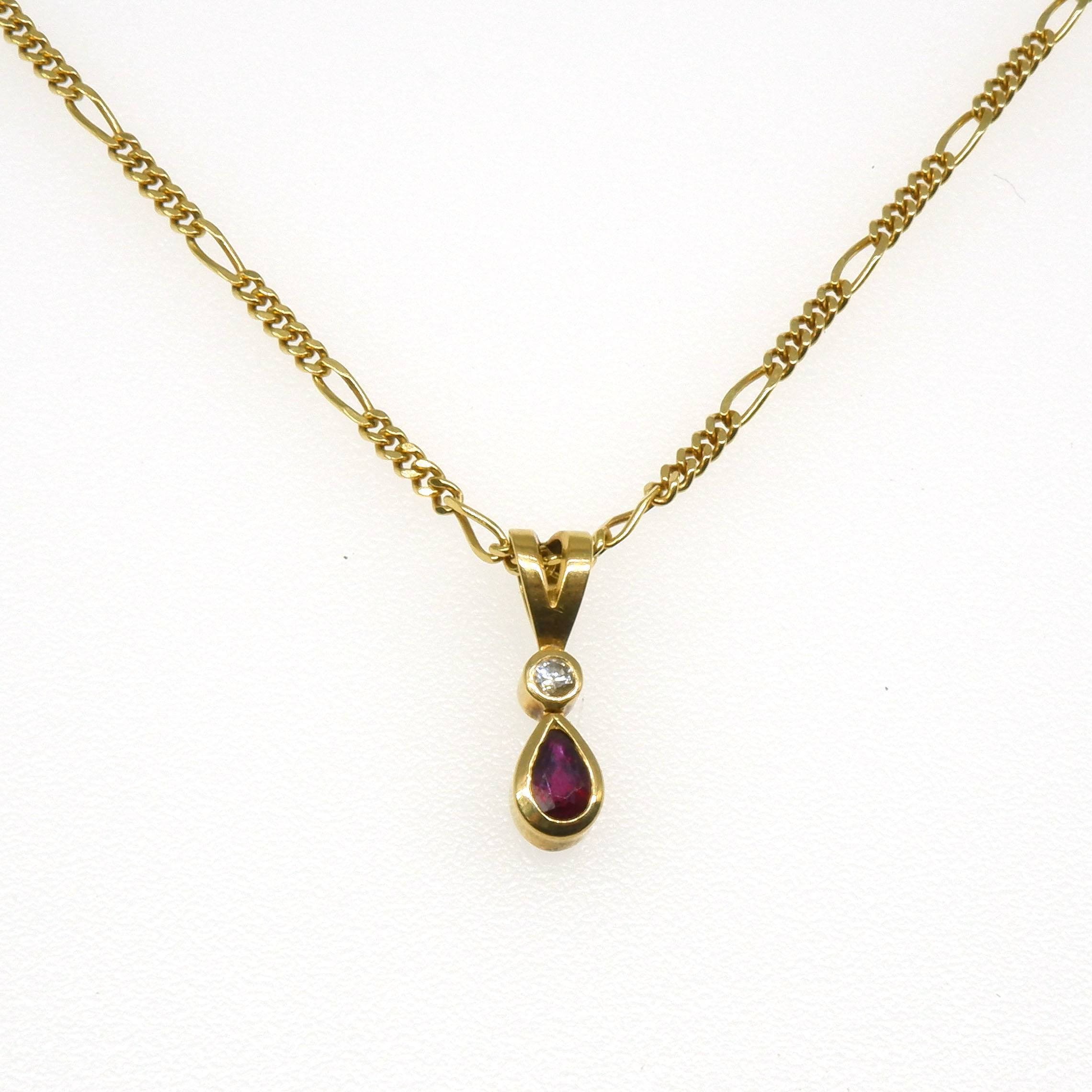'18ct Yellow Gold Long and Short Filed Curb Link Chain, Pendant with Tear Dropped Shaped Ruby and Round Brilliant Cut Diamond Above'