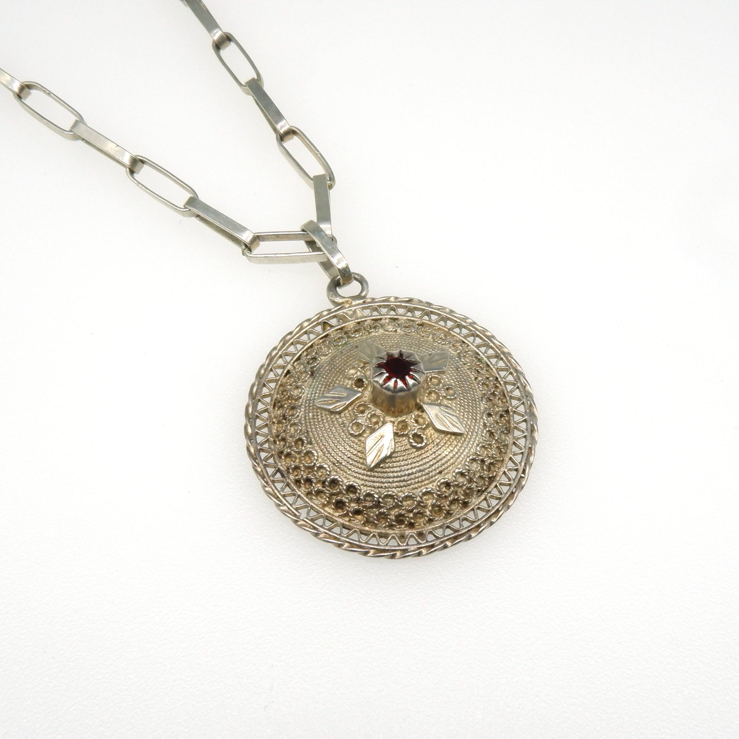 '800 Silver Asian Style Filigree Pendant with Facetted Red Gem on an Oval Link Chain'