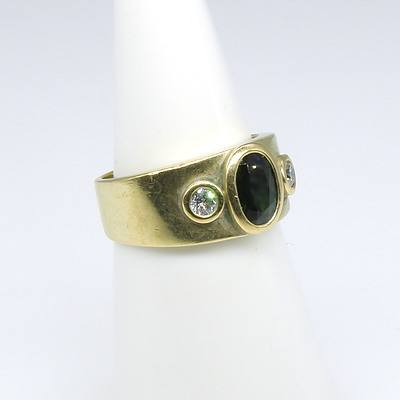 18ct Yellow Gold Ring With Oval Facetted Green Sapphire on Either Side Round Brilliant Cut Diamonds