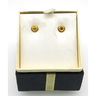 18ct Yellow Gold Stud Earrings with Bezel Set Round Facetted Bright Yellow Sapphire with a Frame