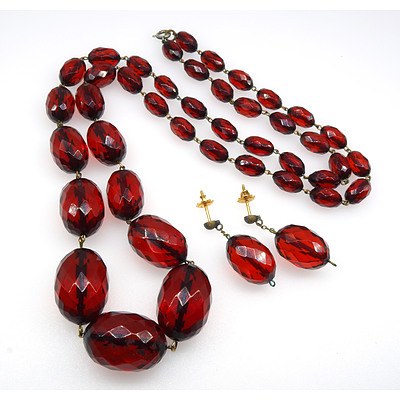 Red Bakelite Graduated Facetted Beads Strung on Wire With Matching Drop Earrings