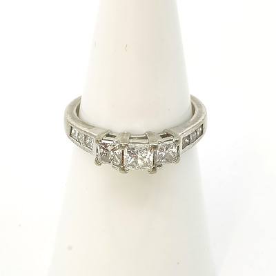 18ct White Gold Ring with at Centre One 0.34ct Princess Cut Diamond with One 0.22ct Diamond Either Side