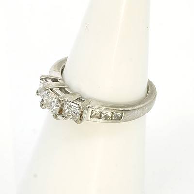 18ct White Gold Ring with at Centre One 0.34ct Princess Cut Diamond with One 0.22ct Diamond Either Side