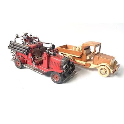 A Tin Model of a Fire Truck and a Wooden Model of a Truck