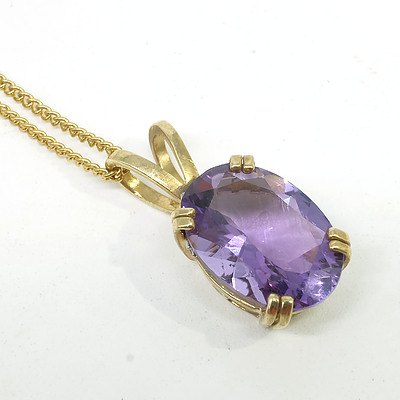 9ct Yellow Gold Pendant With an Oval Facetted Amethyst