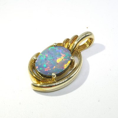 9ct Yellow Gold Pendant with Oval Opal Doublet in Four Claws