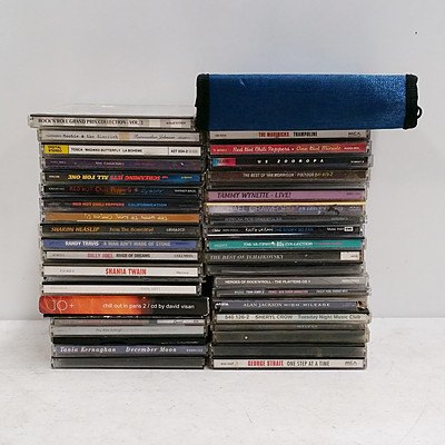 Group of Various CD's Including; Elvis Presley Greatest Hits, Billy Joel Greatest Hits, Justin Timberlake SexyBack, Red Hot Chili Peppers Californication, and More