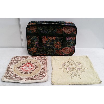 7 Decorative Pillows, Two Pillow Cases and a Fabric Suitcase