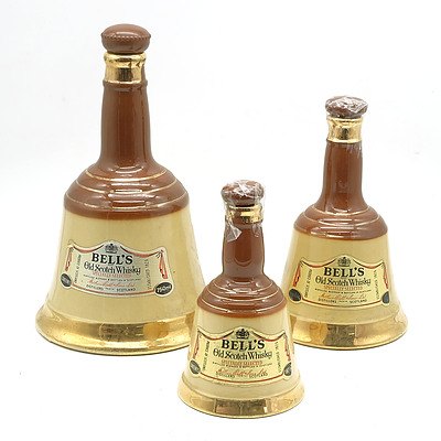 Three Graduating Bells Old Scotch Whisky Bottles