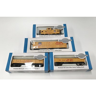 Four Premium HO Scale Silver Series Rolling Stock Model Locomotives and Carriages