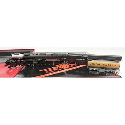 Two HO Model Locomotives and Carriage Sets including, MTH 4500hp Gas Turbine & Tender Set Union pacific (RRP $699) and Rivarossi Union Pacific Heavy Steam Locomotive.