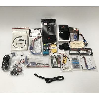 Assorted RC Components including: Electric Motor, Cables, Batteries, Program Cards and More
