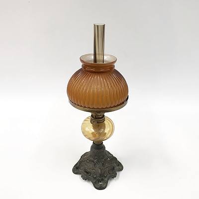 Cast Iron Based Oil Lamp with Cased Amber Opaline Shade