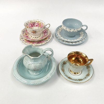 Two Trios and Two Pairs of Cups and Saucers