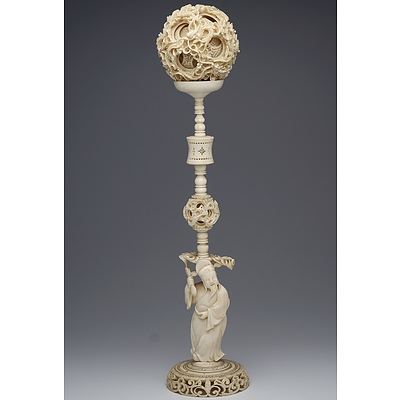 Exceptional Large Antique Chinese Carved Ivory Dragon Puzzle Ball on an Immortal and Lantern Form Stand, Late 19th/Early 20th Century