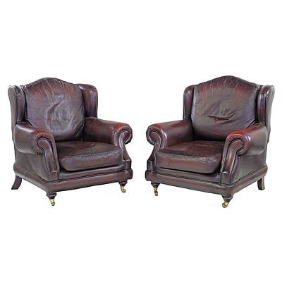Pair of British Made Thomas Lloyd Red Leather 'Consort' Wingback Armchairs and Matching Ottoman