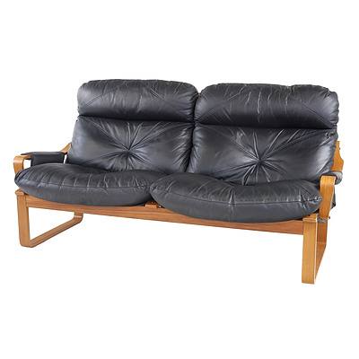 Tessa Black Leather Upholstered Two Seater Lounge Designed by Fred Lowen