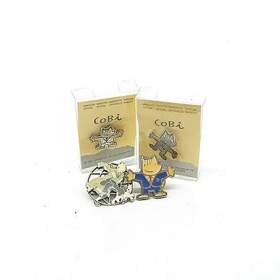 Four Pop Culture Pins, Including Tintin and Cobi