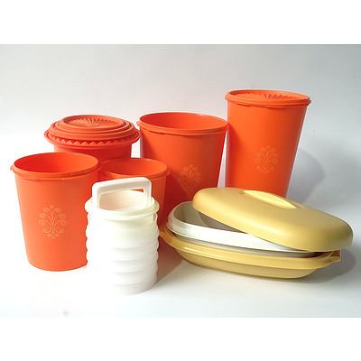 Group of 1980s Tupperware Including Stacking Orange Containers, Microwave Steamer and Stacking Compression Container