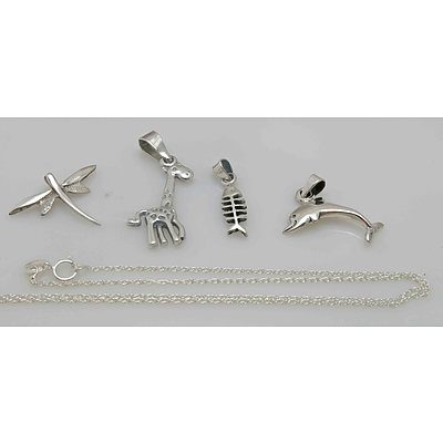 Four Sterling Silver Pendants Or Charms and a Sterling Silver Chain