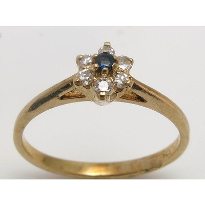 9Ct Gold Ring - Sapphire & 6 Diamonds