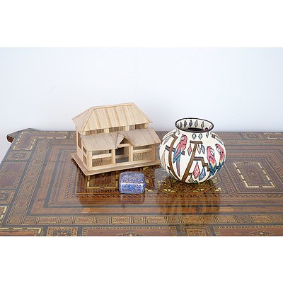 Small Kashmiri Lacquer Box, Central American Woven Fibre Parrot Vase and a Bangladeshi Wood Model of a House