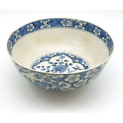 Chinese Blue and White Bowl Decorated with Prunis and Floral Cartouches on a 'Cracked Ice' Ground, Apocryphal Kangxi Mark, Late 19th/Early 20th Century