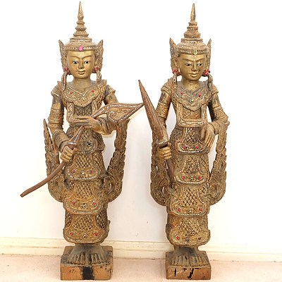 Two Burmese Gilt Wood Warriors with Inlaid Coloured Glass