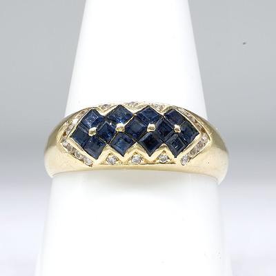 14ct Yellow Gold Ring with Carre Cut Saphires in Checker Board Pattern with Boarder of CZ