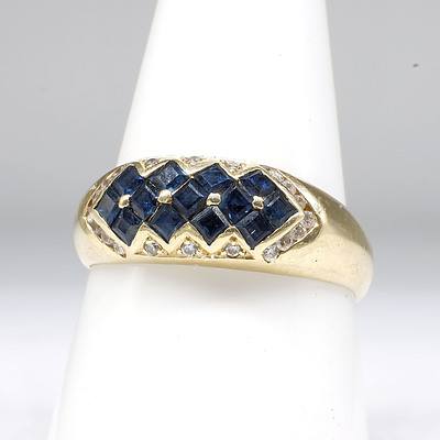 14ct Yellow Gold Ring with Carre Cut Saphires in Checker Board Pattern with Boarder of CZ
