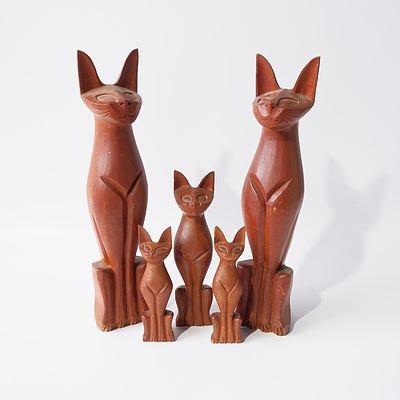 Set of Five Graduating Teak Carved Cats
