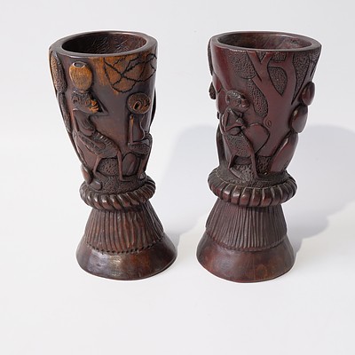 A Pair of Tribal Carved Wood Vases