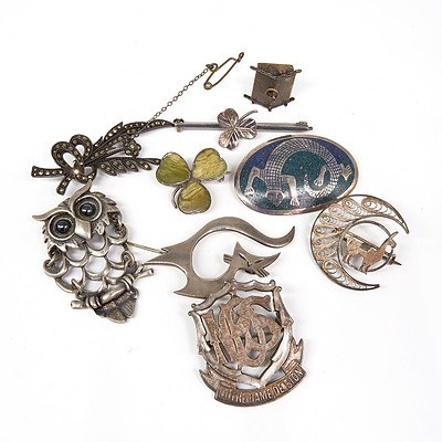 Eight Sterling Silver Brooches and a Sterling Silver Pendant