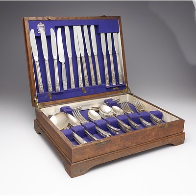 A Oak Cutlery Canteen Containing a Mixture of Silver Plate and Stainless Steel Cutlery from 1938