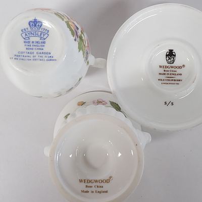 Seven Pieces of Wedgwood Wild Strawberry Patterned Bone China and a Piece of Aynsley Bone China Cottage Garden Pattern