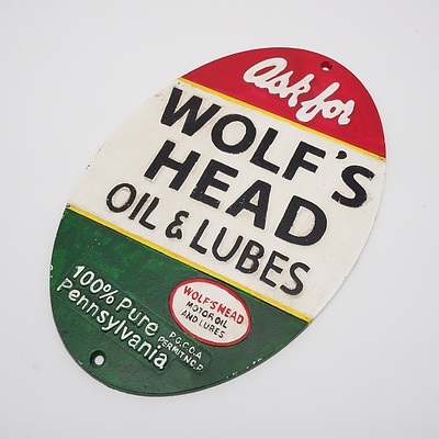 Wolf's Head Oil & Lubes Embossed Cast Iron Sign, Reproduction