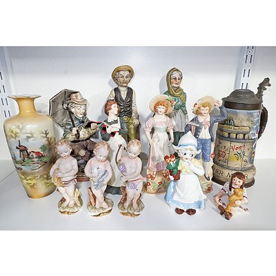 Various Porcelain Figures, Antique Mantle Vase, and German Stein