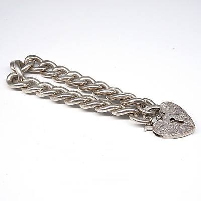 Heavy Sterling Silver Curb Link Bracelet with Engraved Heart Lock