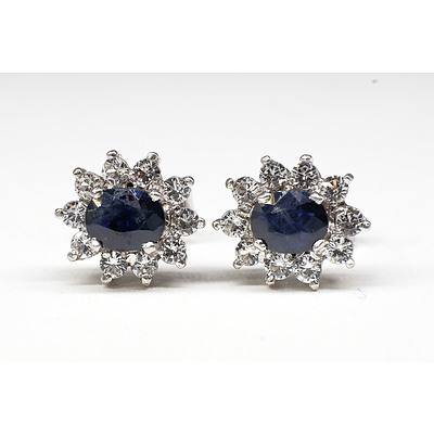 Pair of Sterling Silver Earrings with Australian Sapphire and CZ