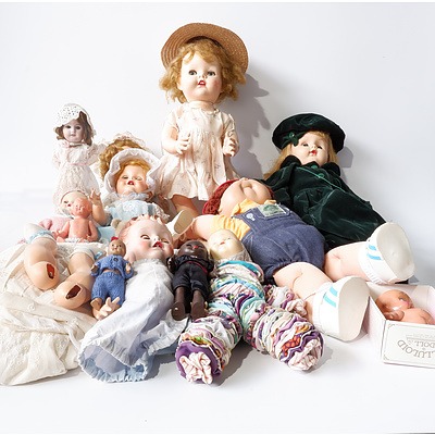 Thirteen Vintage Childrens Dolls in Variety of Sizes