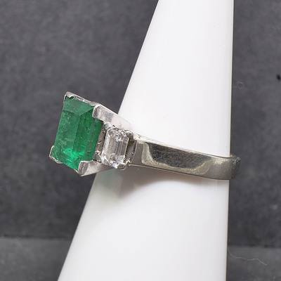 18ct White Gold Ring With 2.42ct Bright Dark Green Emerald with Two Emerald Cut Diamonds