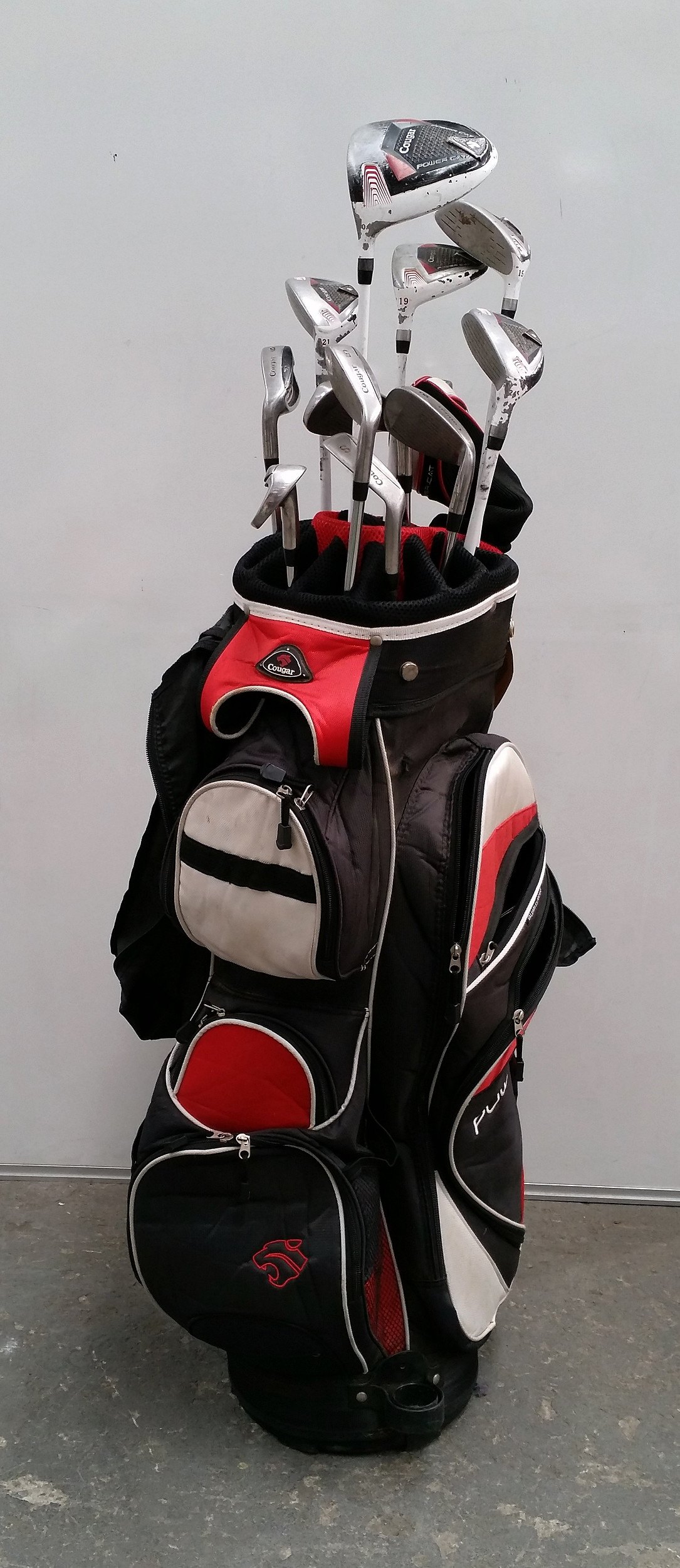 Cougar Golf Bag with Various Golf Lot 1087857 ALLBIDS