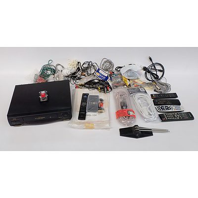 NEC Video Cassette Recorder VHG-104, Two Extension Cords, Assorted Video Audio Cables and Various Remotes